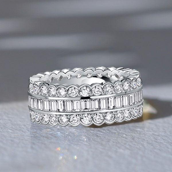 3.74 CT. TW. Channel Set Round & Baguette Eternity Wedding Band in Rhodium-Plated Sterling Silver