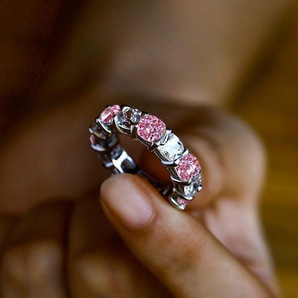 White and Pink Sapphire Cushion Cut Eternity Band in Sterling Silver