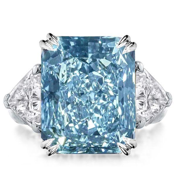 Radiant Cut Blue Topaz Three Stone Ring in Sterling Silver