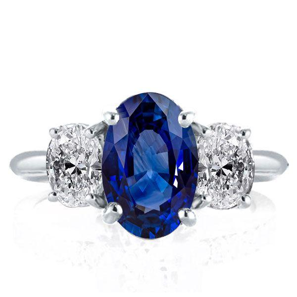 Oval Cut Blue Sapphire Three Stone Engagement Ring in Sterling Silver