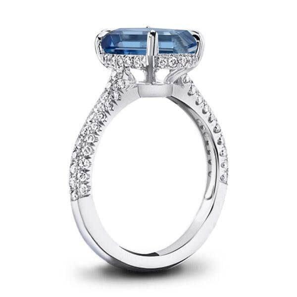 Emerald Cut Aquamarine Engagement Ring in Rhodium Plated Sterling Silver