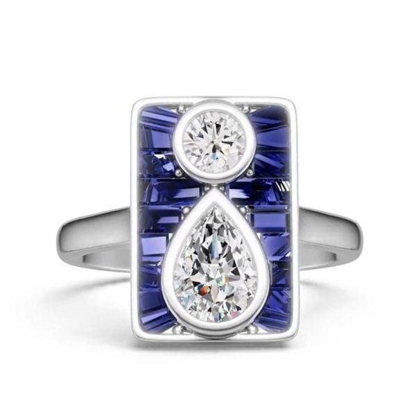 Unique Pear and Round White Blue Sapphire Engagement Ring in Rhodium-Plated Sterling Silver