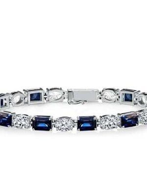 Alternating Blue and White Emerald Cut Tennis Bracelet in Sterling Silver