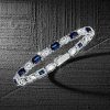 Alternating Blue and White Emerald Cut Tennis Bracelet in Sterling Silver