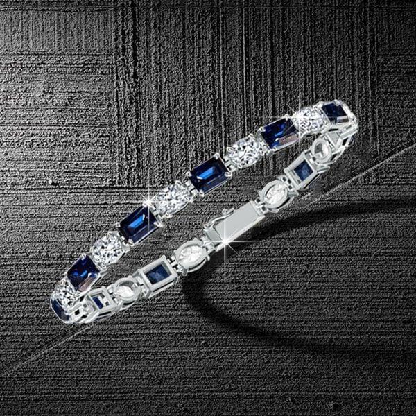Alternating Blue and White Emerald Cut Tennis Bracelet in Sterling Silver