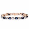 Alternating Blue and White Emerald Cut Tennis Bracelet in Sterling Silver