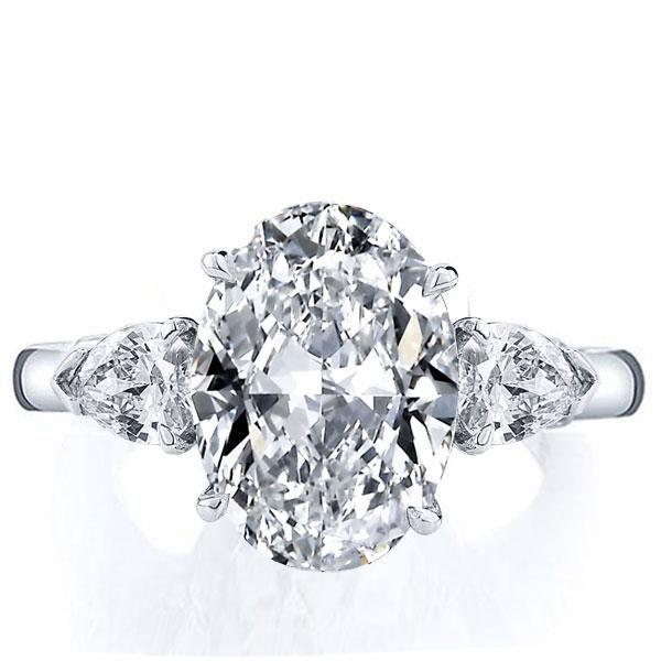 Oval Cut Sterling Silver Engagement Ring with Pear Side Stones (5 Carat Center Stone)