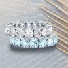 Round Cut Aquamarine Eternity Wedding Band in Rhodium-Plated Sterling Silver