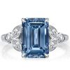 Emerald Cut Blue Topaz Engagement Ring in Sterling Silver