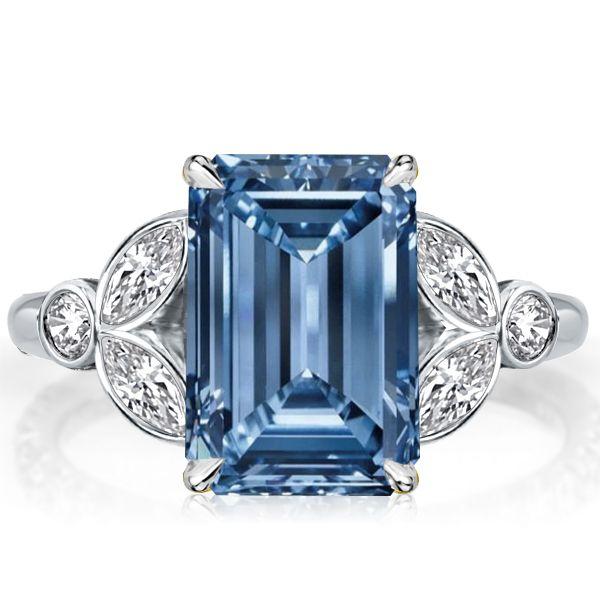 Emerald Cut Blue Topaz Engagement Ring in Sterling Silver