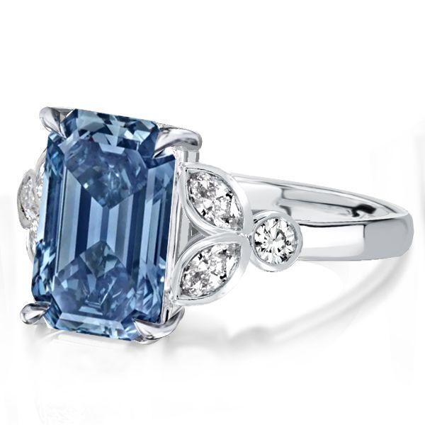 Emerald Cut Blue Topaz Engagement Ring in Sterling Silver