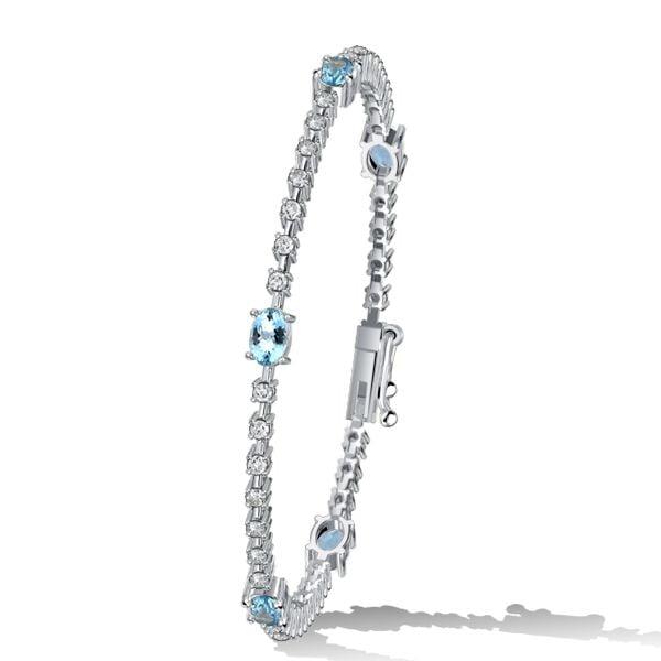 Aquamarine and White Stone Oval Cut Tennis Bracelet in Sterling Silver