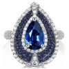 Pear Shaped Halo Engagement Ring in Rhodium Plated Sterling Silver