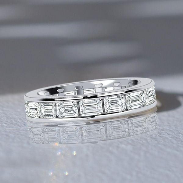 4.5mm Channel Set Emerald Cut Eternity Wedding Band in Sterling Silver