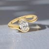 Oval Cut Engagement Ring for Women in 18K Gold Plated Sterling Silver with Half Bezel Setting