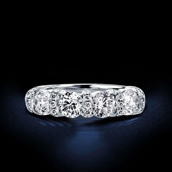 Four Stone Created White Sapphire Wedding Band in Rhodium Plated Sterling Silver