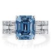 Emerald Cut Blue Topaz Three Stone Wedding Ring Set in Rhodium Plated Sterling Silver