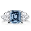Three Stone Emerald Blue Topaz Engagement Ring in Rhodium Plated Sterling Silver