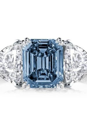 Three Stone Emerald Blue Topaz Engagement Ring in Rhodium Plated Sterling Silver
