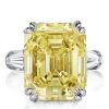 Three Stone Emerald Cut Created Topaz Engagement Ring in Rhodium Plated Sterling Silver