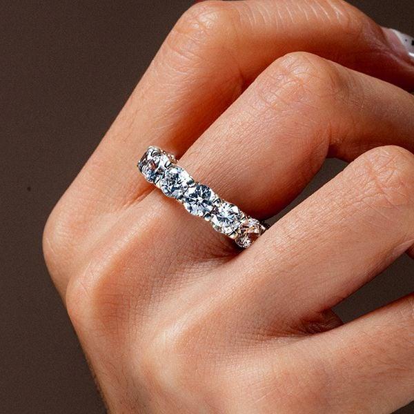 Eternity Cross Prong Round Cut Wedding Band in Sterling Silver