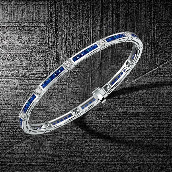 Princess Cut Blue Sapphire Tennis Bracelet in Rhodium-Plated 925 Sterling Silver
