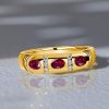 Oval Cut Ruby Band Ring - 18K Gold Plated Sterling Silver - 0.54 CT. TW.