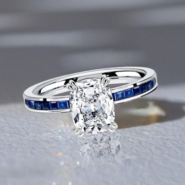 Channel Set Cushion Cut White Sapphire Engagement Ring in Rhodium Plated Sterling Silver
