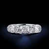 Four Stone Created White Sapphire Sterling Silver Wedding Band