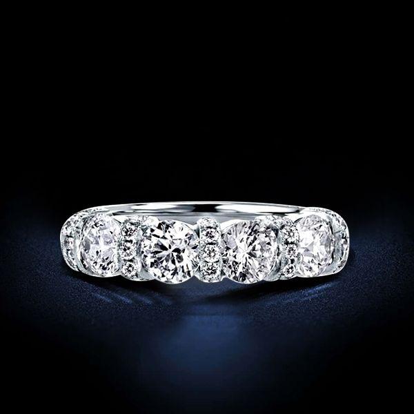 Four Stone Created White Sapphire Sterling Silver Wedding Band