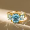 Five Stone Radiant Cut Aquamarine Engagement Ring in Sterling Silver with Gold Plating