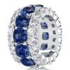 Cushion Cut Created Sapphire Triple Row Eternity Wedding Band in Sterling Silver
