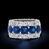 Cushion Cut Created Sapphire Triple Row Eternity Wedding Band in Sterling Silver