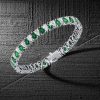 Sterling Silver Pear Cut Tennis Bracelet with White & Emerald Stones