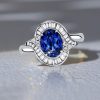 Sterling Silver Channel Set Oval Blue Sapphire Halo Engagement Ring