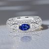 Three Stone Oval Blue Sapphire Sterling Silver Anniversary Band Ring (2.00 CTW)