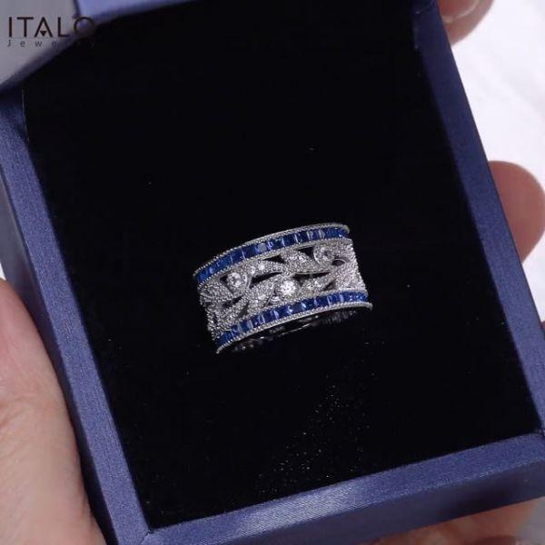 Round Cut White & Blue Sapphire Wedding Band in Sterling Silver