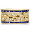 Round Cut White & Blue Sapphire Wedding Band in Sterling Silver