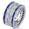 Round Cut White & Blue Sapphire Wedding Band in Sterling Silver