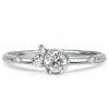 White Sapphire Flurry Engagement Ring in Sterling Silver Bezel Setting