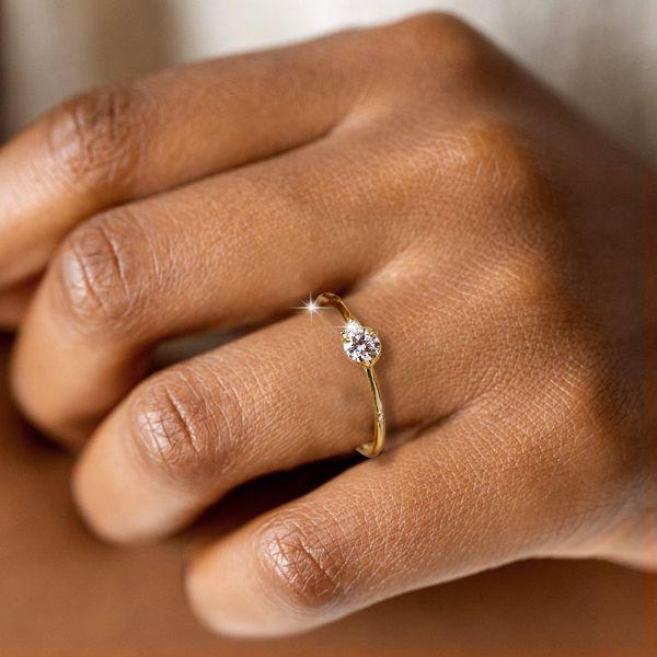 White Sapphire Flurry Engagement Ring in Sterling Silver Bezel Setting
