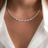 Blue Topaz Baguette and Round Cut Bezel Set Necklace in Rhodium-Plated Sterling Silver