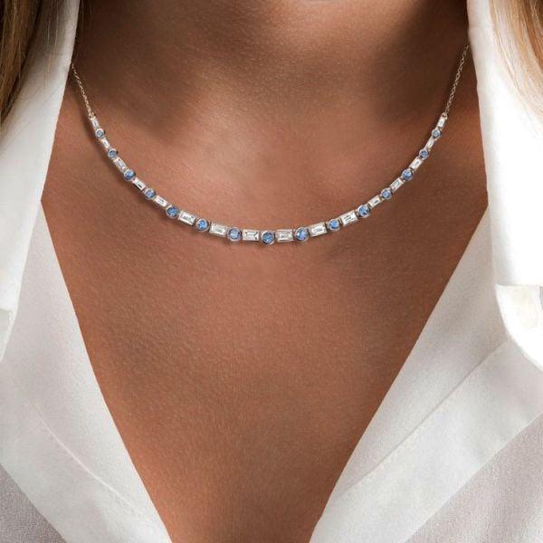 Blue Topaz Baguette and Round Cut Bezel Set Necklace in Rhodium-Plated Sterling Silver