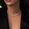 Blue Topaz Baguette and Round Cut Bezel Set Necklace in Rhodium-Plated Sterling Silver