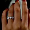 Alternating Emerald Cut and Round Stone Eternity Band in 925 Sterling Silver