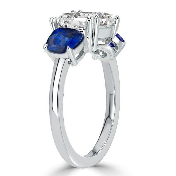 Cushion Cut Blue Topaz Three Stone Engagement Ring in Sterling Silver