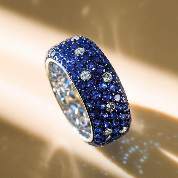 Five Row Blue Sapphire Pave Eternity Wedding Band in Rhodium Plated Sterling Silver