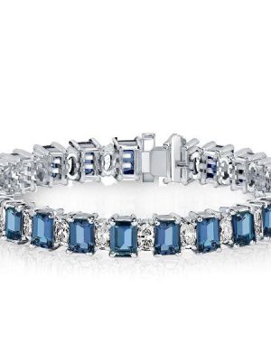 Emerald Cut Blue Topaz Tennis Bracelet in Sterling Silver
