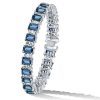 Emerald Cut Blue Topaz Tennis Bracelet in Sterling Silver