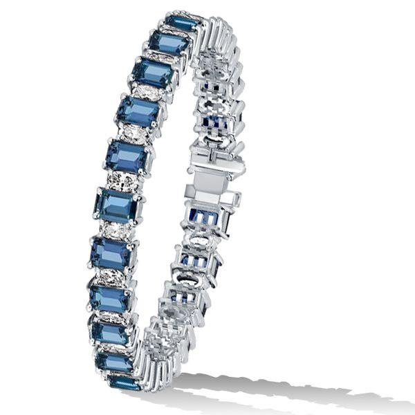 Emerald Cut Blue Topaz Tennis Bracelet in Sterling Silver